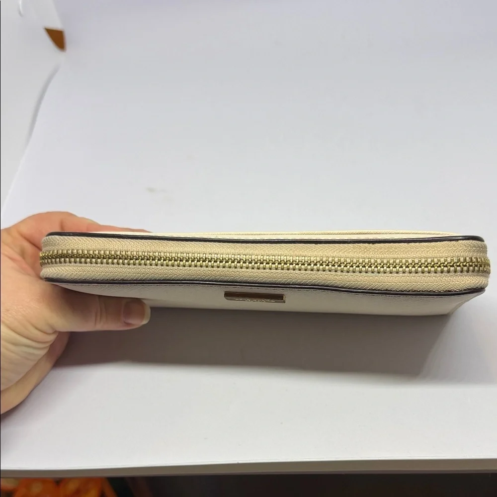Kate Spade Newbury Lane Neda Zip Around Wallet in durable cross-hatched leather
